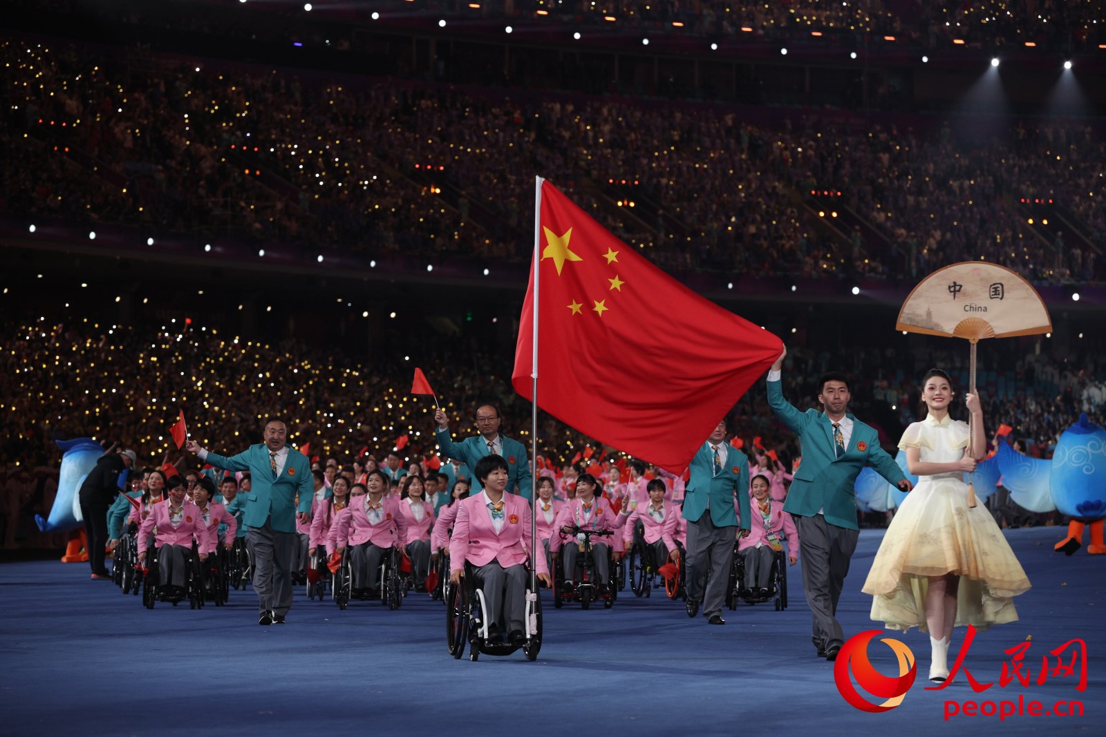 開幕式上，中國體育代表團入場。人民網(wǎng) 周靜圓攝