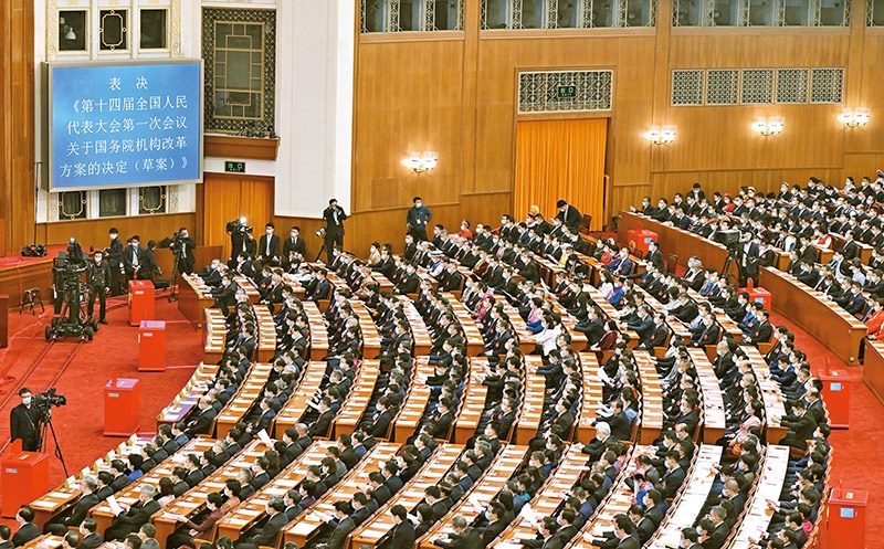 2023年3月10日，十四屆全國人大一次會議在北京人民大會堂舉行第三次全體會議，表決通過了關于國務院機構(gòu)改革方案的決定。圖為會議現(xiàn)場。 新華社記者 岳月偉/攝